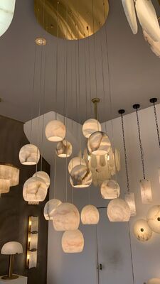 Ball Yatay Oval Taş Alabaster Restoran Sarkıt Merdiven Yaratıcı Sanat Lineer LED Mermer Küre Küme Avize